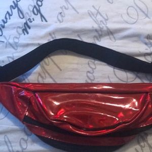 A red glossy Fannypack.